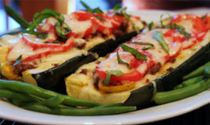 Stuffed Zucchini with Sausage, Cheese and Fresh Tomatoes